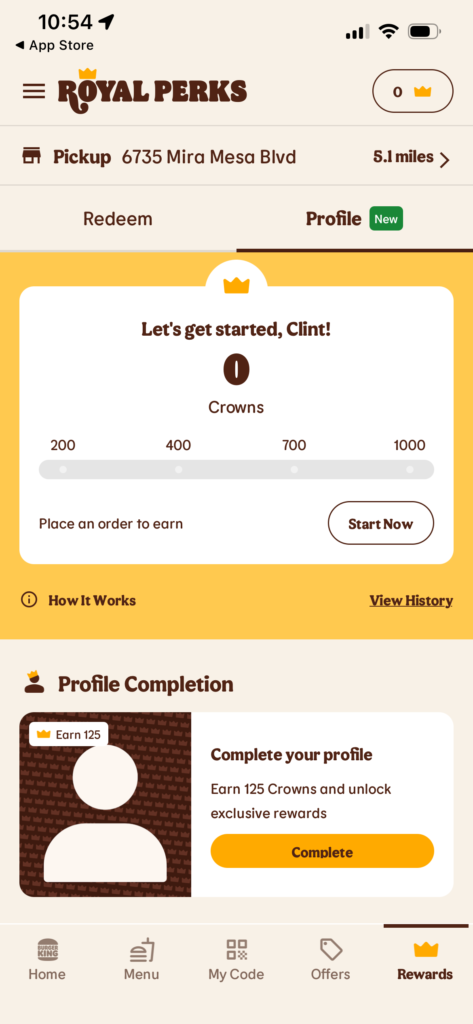 Profile completion screen showing crowns and rewards for the Burger King app.
