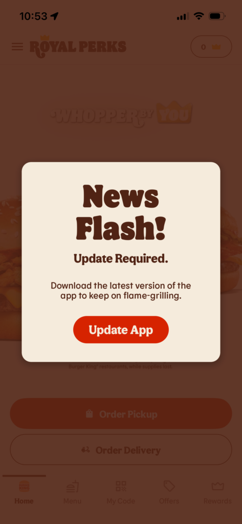 Alert modal requesting app update with button to update.