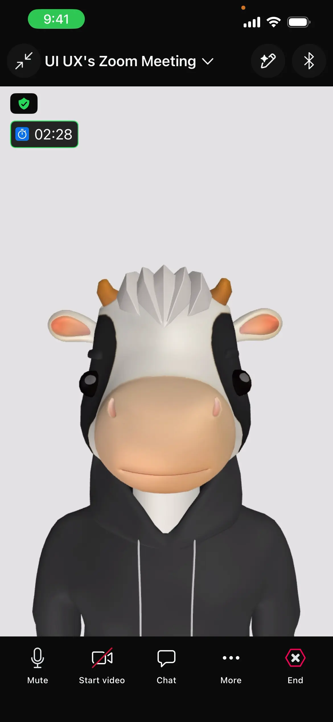 Video call screen showing a user with a cow avatar and control buttons below.